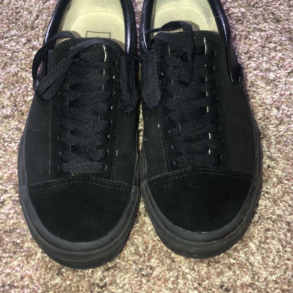 Black checkered Vans